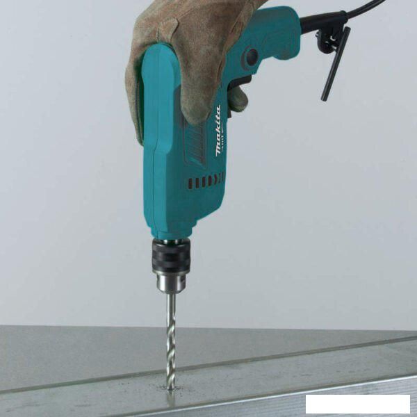 Безударная дрель Makita M0600B
